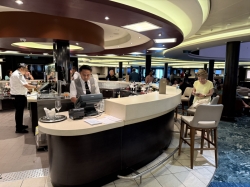 Norwegian Breakaway Atrium Bar picture Uploaded in 2026 Photo courtesy of Steve Millay. Norwegian Breakaway Atrium Bar picture